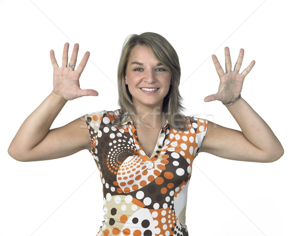 smiling blond girl showing two open hands Stock photo © prill