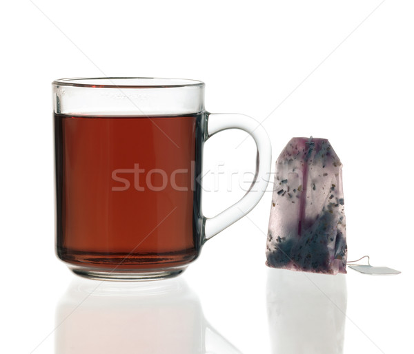 Ceasca de ceai ceai sac sticlă lumina Imagine de stoc © prill