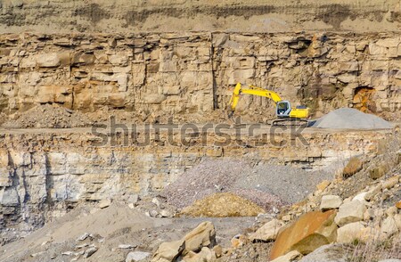 Escavadora edifício construção rocha pedra industrial Foto stock © prill