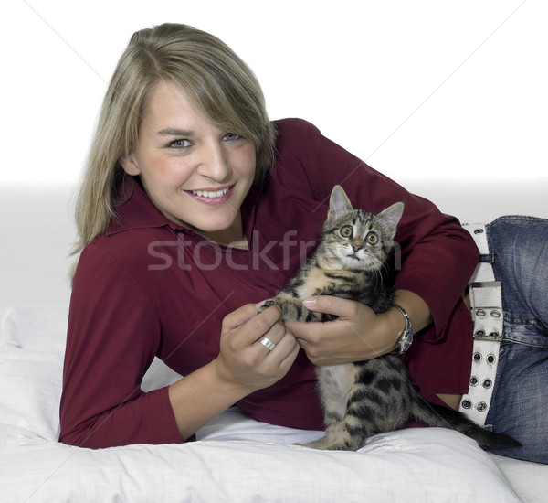 smiling blond girl and kitten Stock photo © prill
