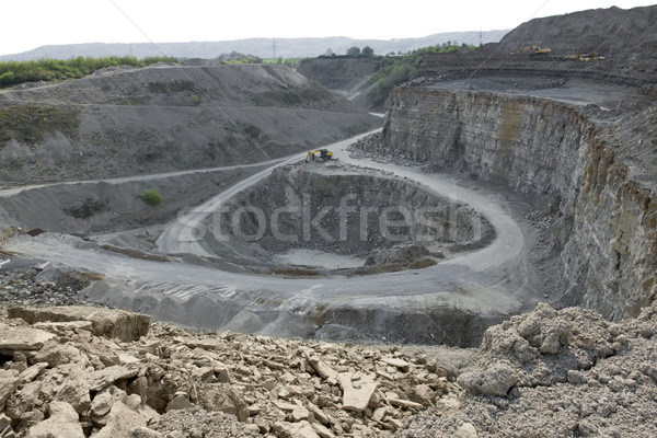 quarry diggers and dump trucks Stock photo © prill