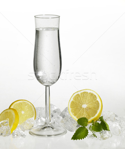 clear drink and citrus fruits Stock photo © prill