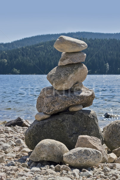 Stock photo: waterside scenery with pebble pile
