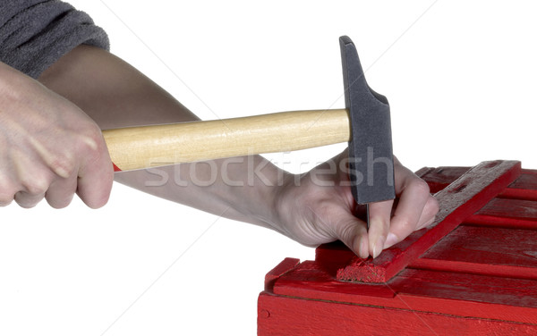 hammering a red wooden box Stock photo © prill