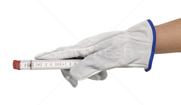 gloved hand with pocket rule Stock photo © prill
