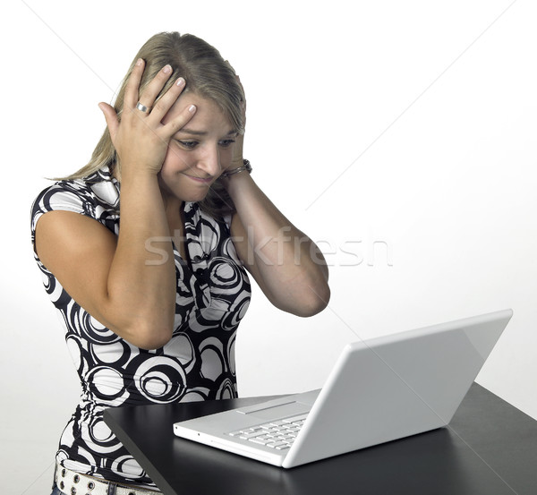 Stock photo: blonde computing girl - shit happens