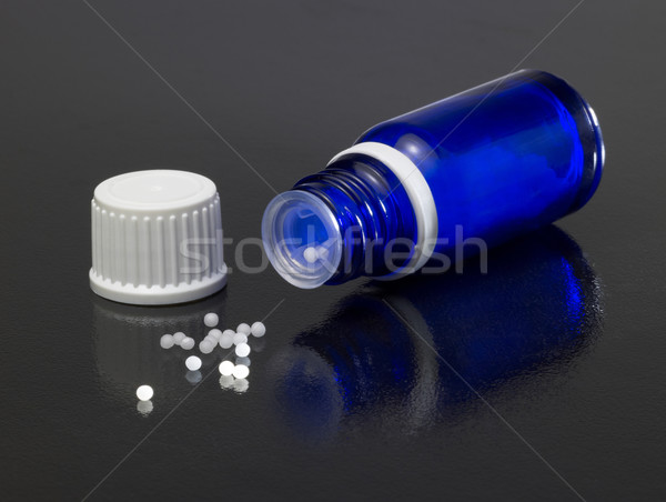 small bottle and globules Stock photo © prill