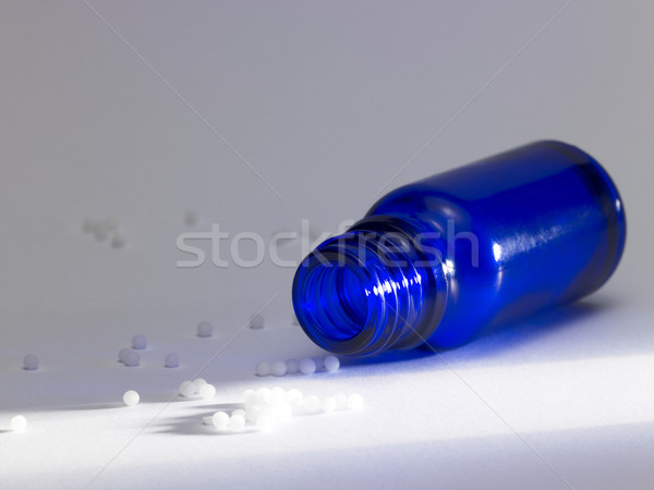 small bottle and globules Stock photo © prill