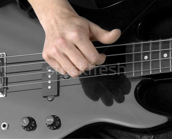 hand and electric bass Stock photo © prill