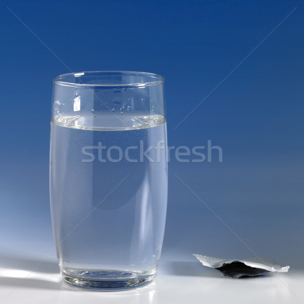 glass of water in blue back Stock photo © prill