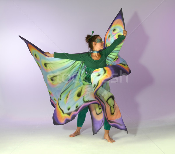 Dança borboleta mulher mulher jovem colorido traje Foto stock © prill