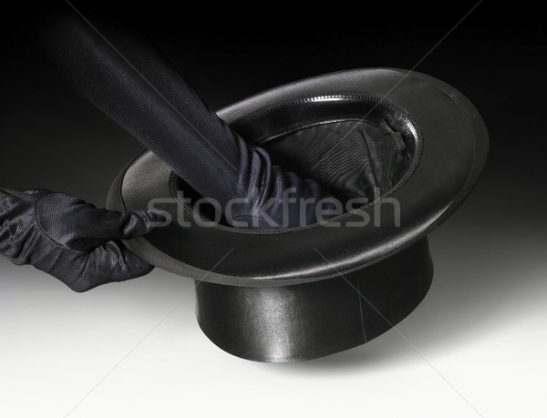 magic stovepipe hat and gloved hands Stock photo © prill