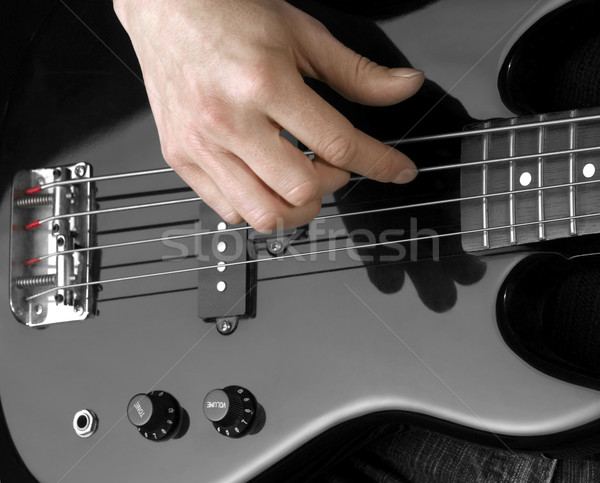 Strony bas gitara kobiet szczegół czarny Zdjęcia stock © prill