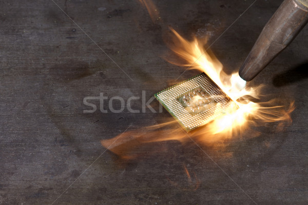 Cpu destruction soudage lampe de poche grand flamme Photo stock © prill