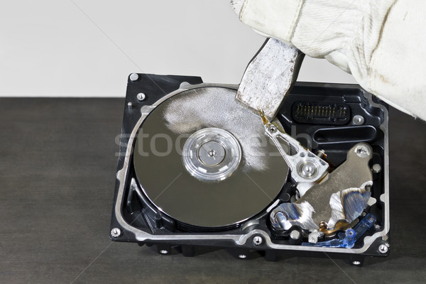 Stock photo: hard disk and chisel