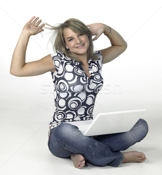 cute blond computing girl takes a break Stock photo © prill