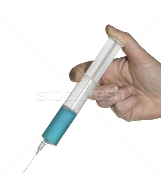 hand and syringe Stock photo © prill
