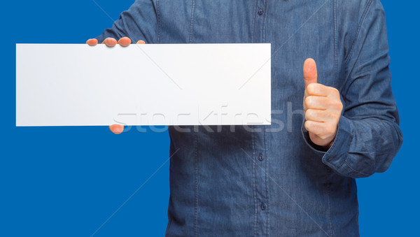 man holding a sign Stock photo © prill