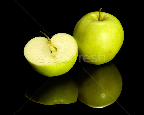 Stock photo: apple on reflective ground