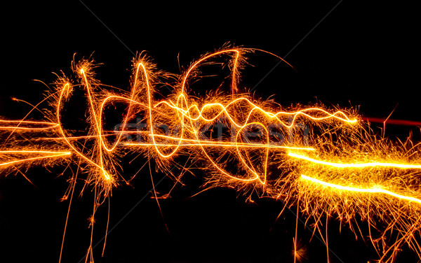 swinging fireworks Stock photo © prill