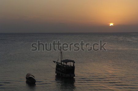 Idílico puesta del sol hermosa mar barcos agua Foto stock © prill
