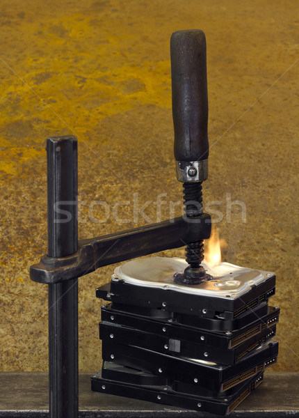 burning vise and hard disks Stock photo © prill