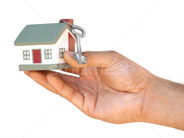 Stock photo: Layout cottages holds hand