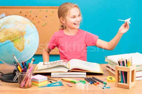 Young girl dreaming about flying round the world Stock photo © przemekklos