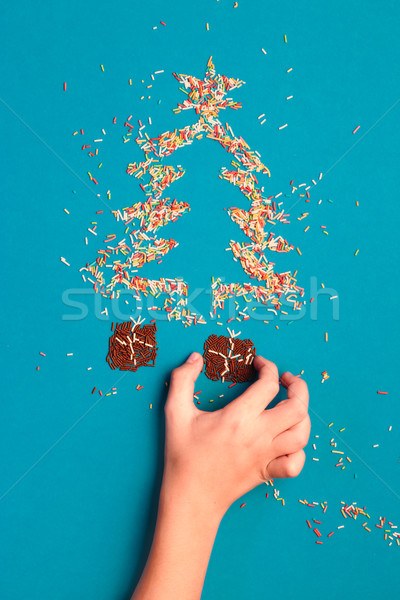 Awaiting for Christmas. Symbols of christmas tree and gifts made Stock photo © przemekklos