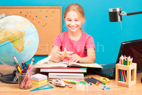 小さな 笑みを浮かべて 少女 宿題 鉛筆 教育 ストックフォト © przemekklos