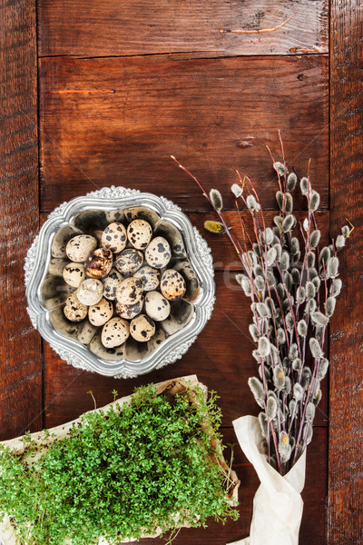Easter composition of cress, catkins and eggs on wooden table Stock photo © przemekklos