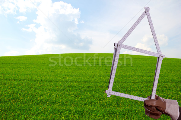 folding rule in front of green lawn Stock photo © pterwort