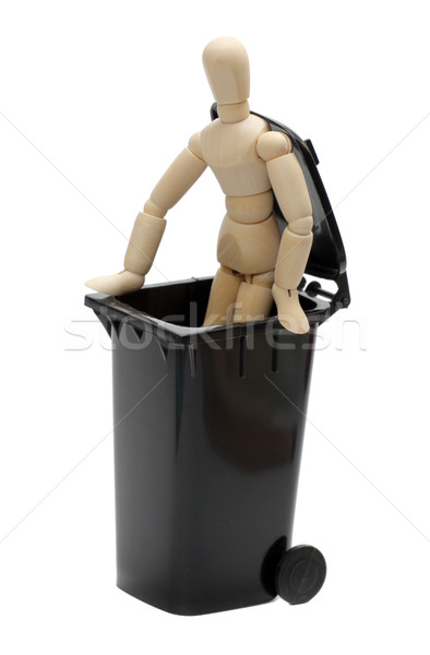 wooden doll in garbage bin Stock photo © pterwort