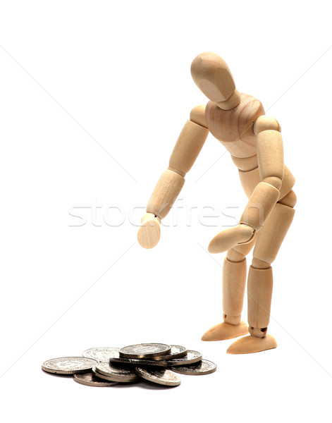 wooden doll and silver coins Stock photo © pterwort