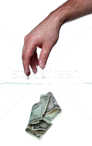 hand and dollar notes in water Stock photo © pterwort