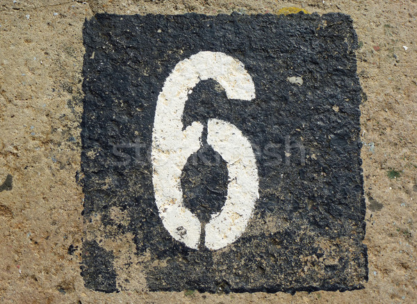 6 - weathered number on old stone Stock photo © pterwort