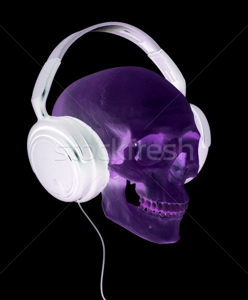 spooky cranium with headphones Stock photo © pterwort