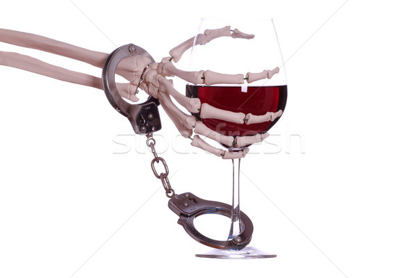 Csontváz kéz bor bilincs üveg biztonság Stock fotó © pterwort