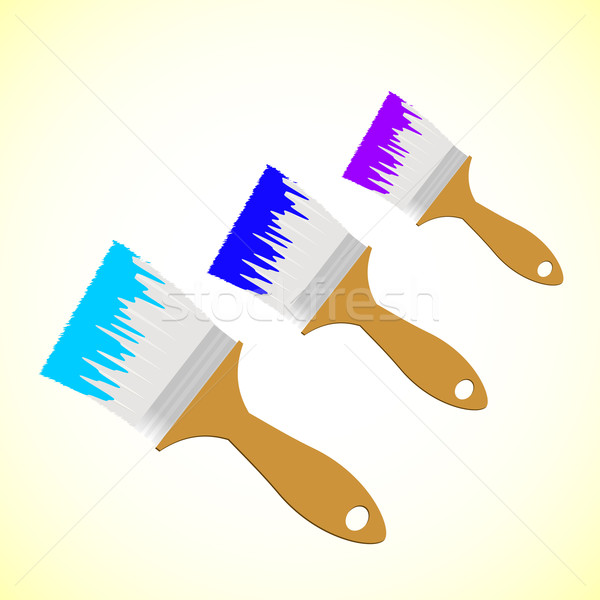 Three colour paint brushes on yellow smooth background Stock photo © punsayaporn