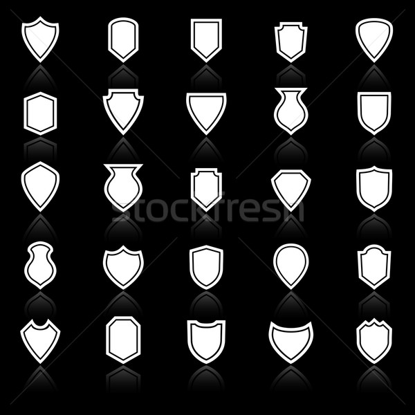 Shield icons with reflect on black background Stock photo © punsayaporn