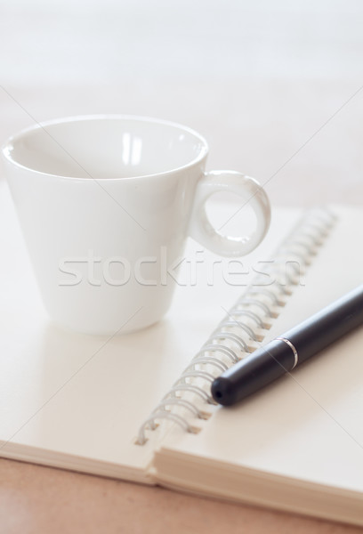 Pluma espiral cuaderno taza de café stock foto Foto stock © punsayaporn