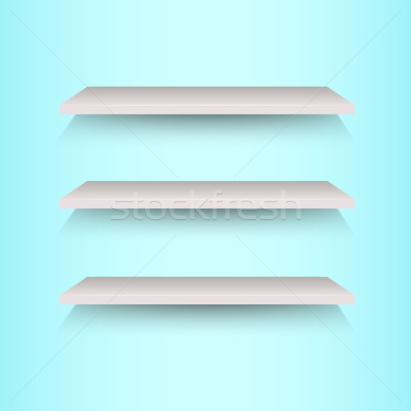 Book shelves on blue background Stock photo © punsayaporn