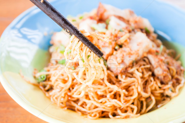Close up chopstick holding a group of yellow noodles  Stock photo © punsayaporn