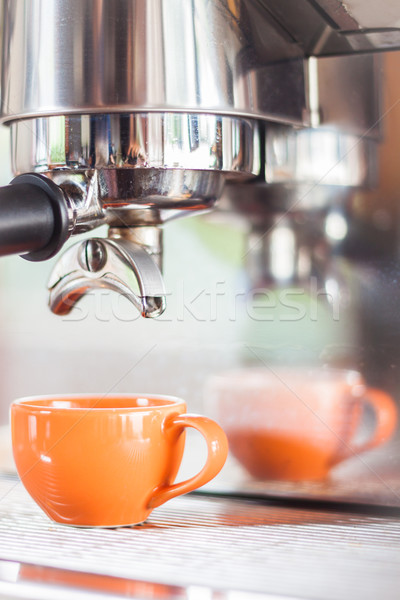 Single shot in orange cup of coffee Stock photo © punsayaporn