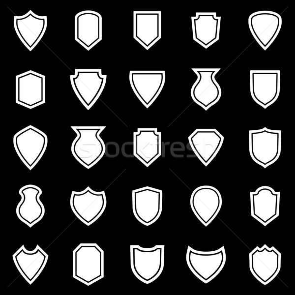 Shield icons on black background Stock photo © punsayaporn