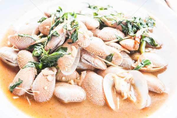 Stir fried clams with roasted chili paste up close Stock photo © punsayaporn