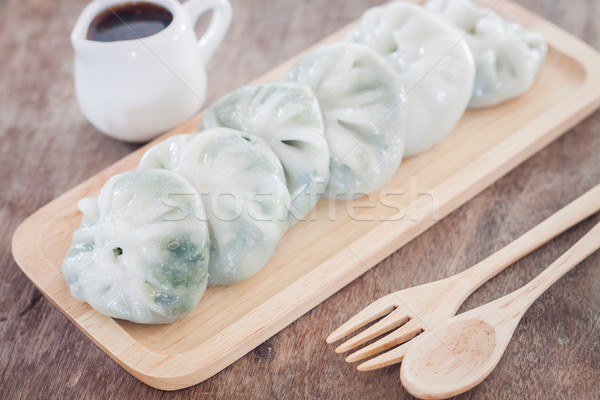 Chinese leek steamed dessert on wooden table Stock photo © punsayaporn