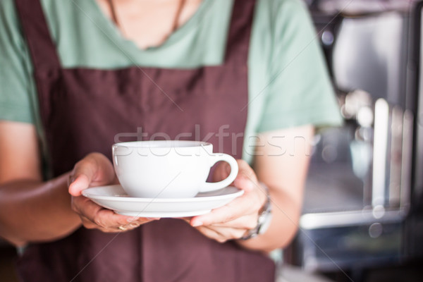 Barista serving freshly brewed coffee  Stock photo © punsayaporn