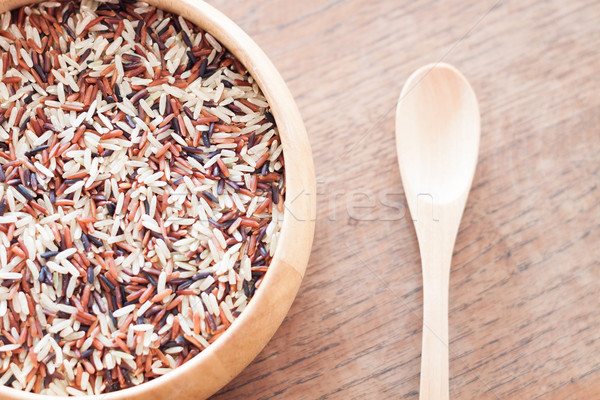 Organic Dry Multi Grain Rice in wooden bowl Stock photo © punsayaporn