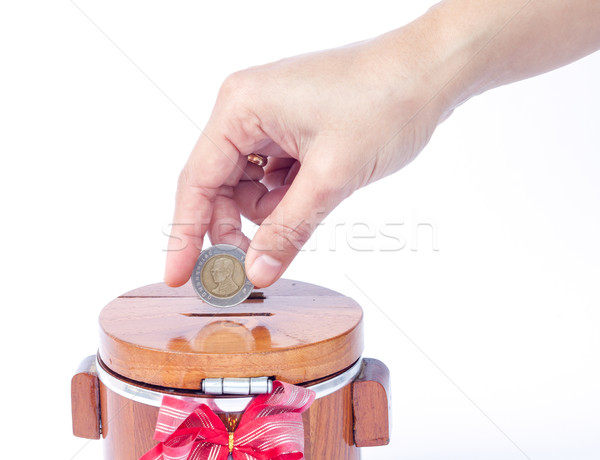 Putting coin to save money Stock photo © punsayaporn